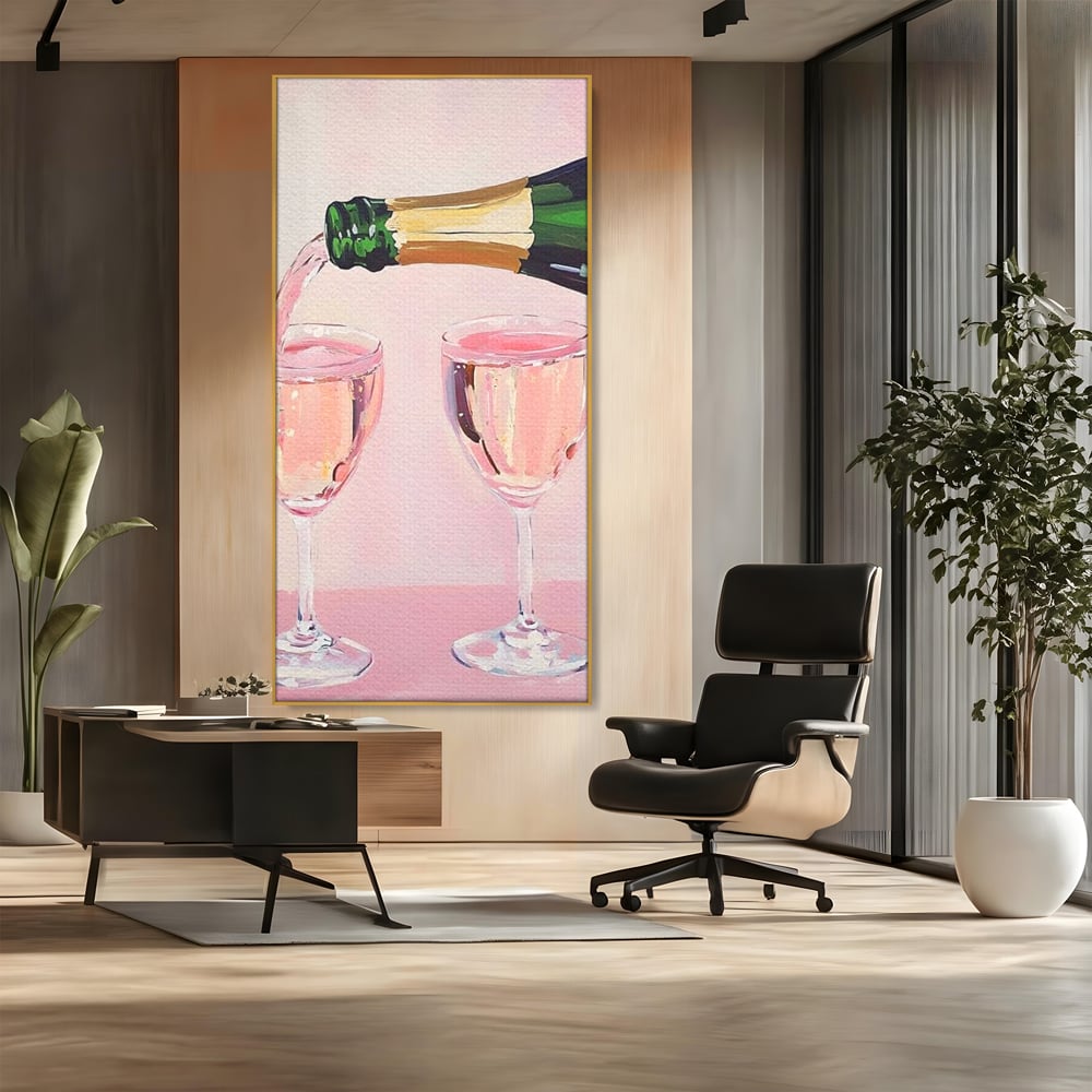 Tablou canvas cu pictura cu sticla si pahare de sampanie roz, in rama de aluminiu auriu, pe perete intr-un birou